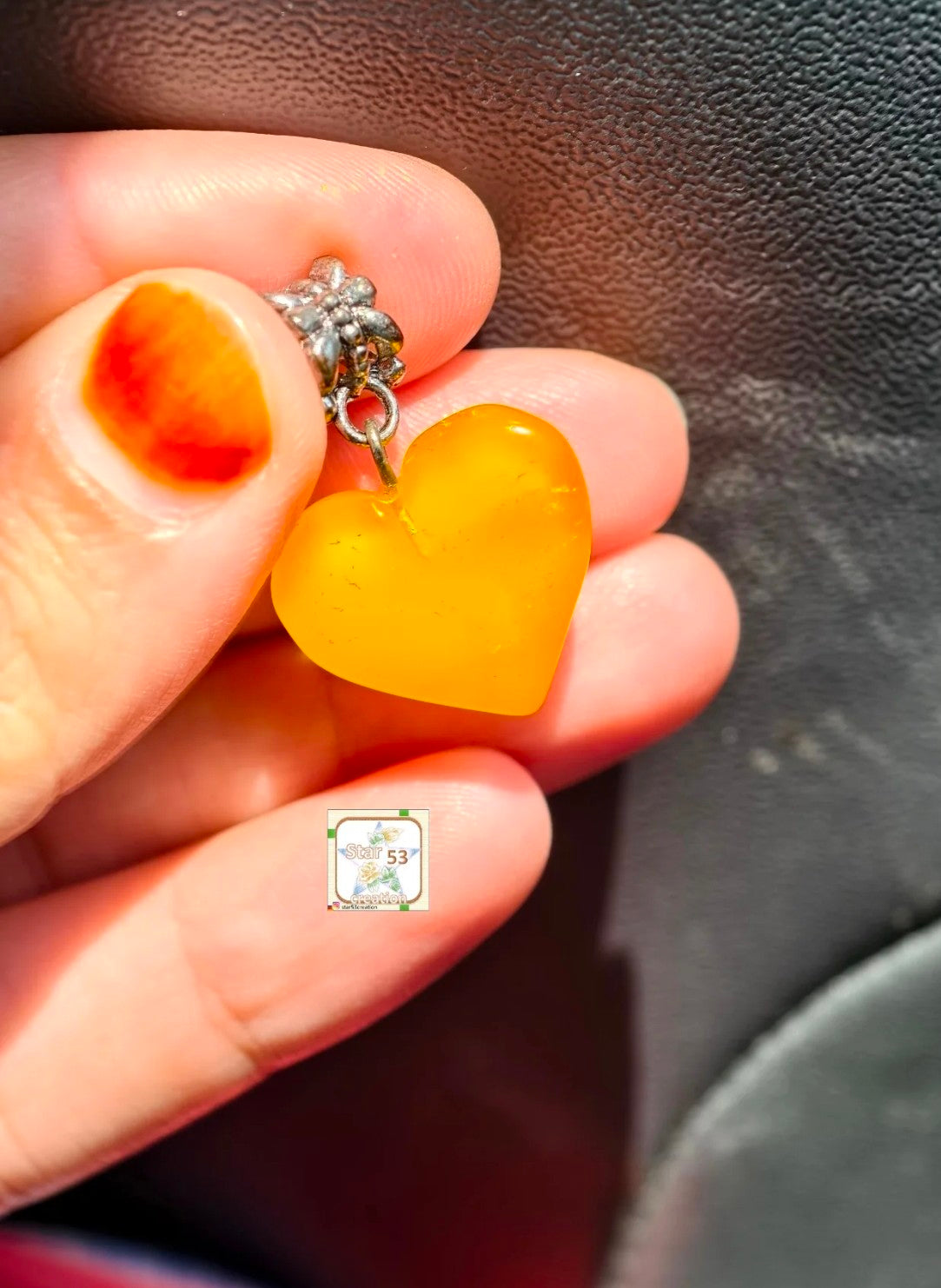 Amber heart pendant