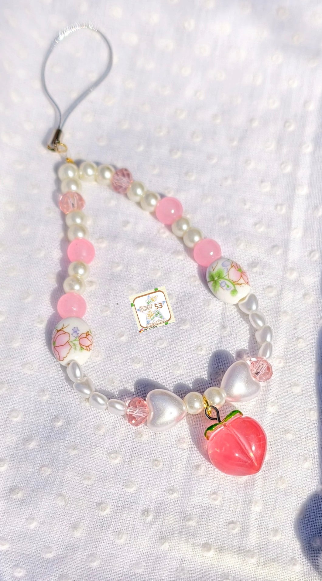 Peachy beaded phone charm