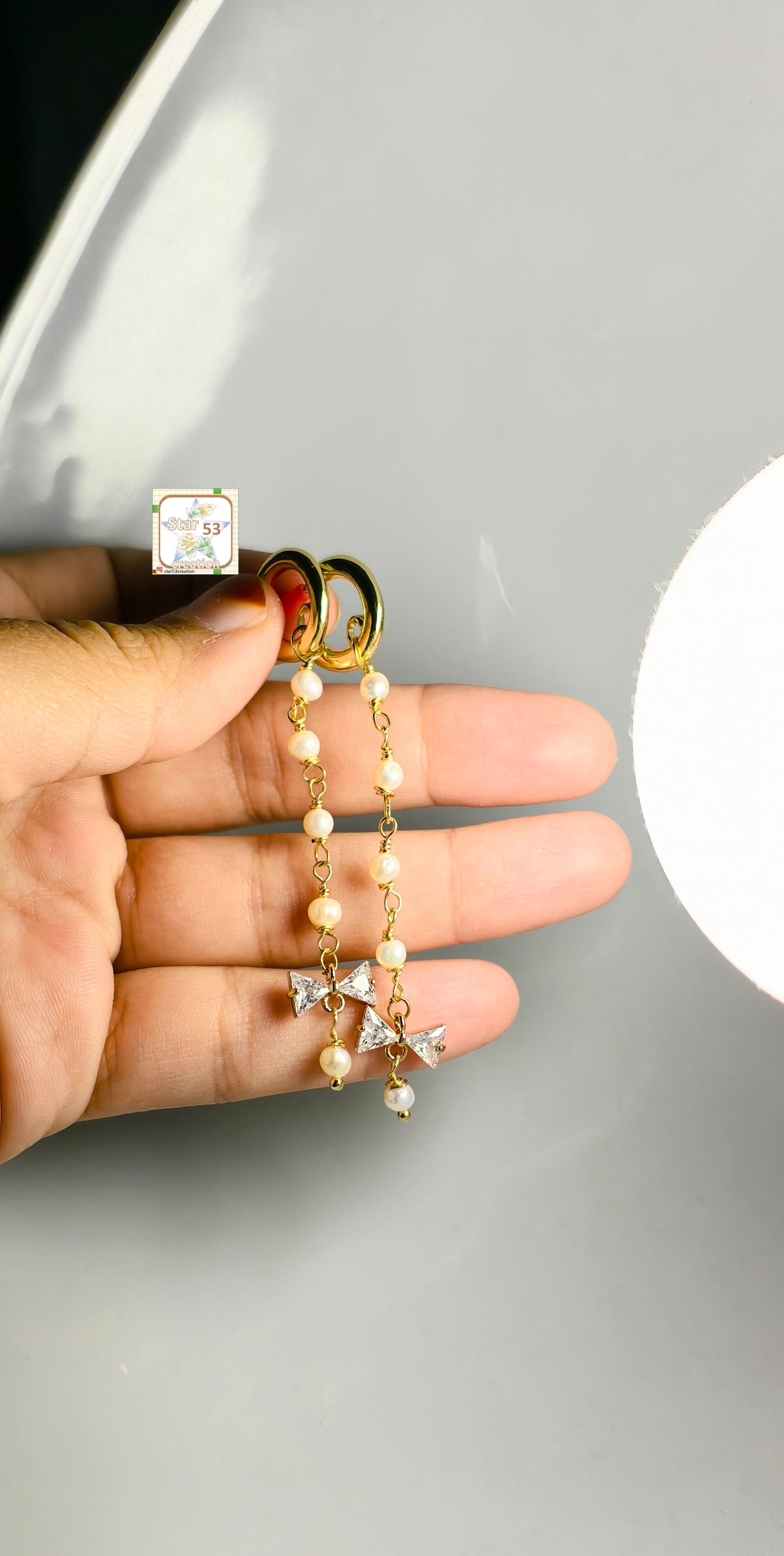 Pearly twinkle dangle earrings